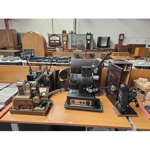 581 - Four vintage movie projectors - Cinetechic, Pathescope and Ampro (untested)