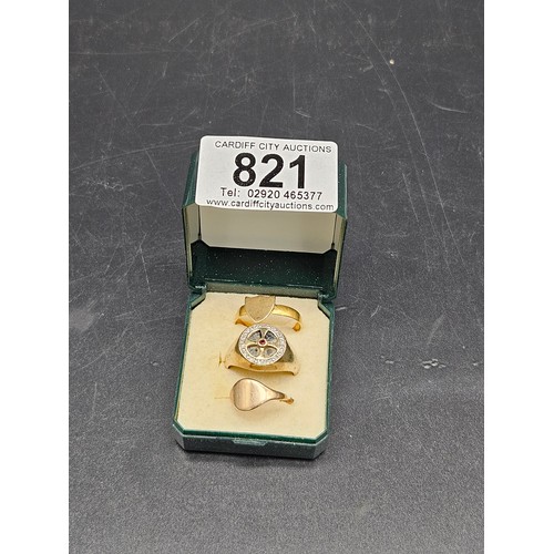 821 - Three 9k gold rings (one being scrap) - combined wight 8.7 grams