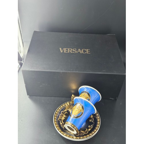 825 - A set of eight Versace 