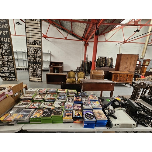 608 - A quantity of Xbox 360, Game Boy Advance, Playstation etc games, two Xbox consoles, controllers etc,... 