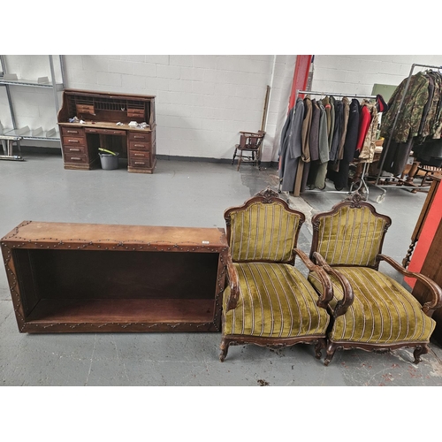 639 - A pair of upholstered armchairs together with a leatherette bound bookcase with adjustable shelf