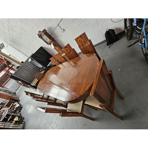 666 - A large rosewood boardroom/dining table and eleven chairs. Purchased in 1925 by Ebbw Vale Steelworks... 