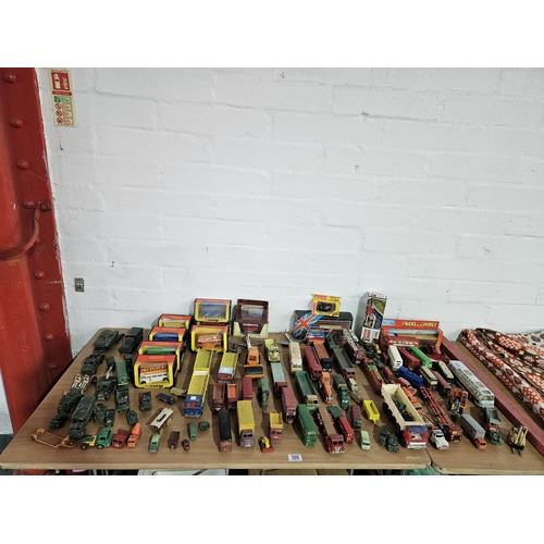 300 - A collection of boxed buses and playworn diecast vehicles - Corgi, Dinky, Lesney, etc