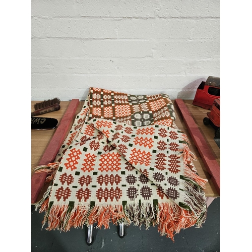 306 - A double sided Welsh woollen blanket - orange, cream and green - size 60 inches x 90 inches