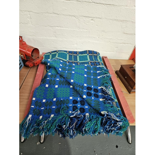 308 - A double sided Welsh woollen blanket - blue, green and black - size 46 inches x 88 inches