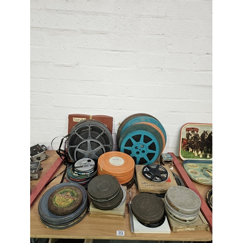 312 - Vintage films reels - mostly cased - all various - all unchecked and condition of film unknown