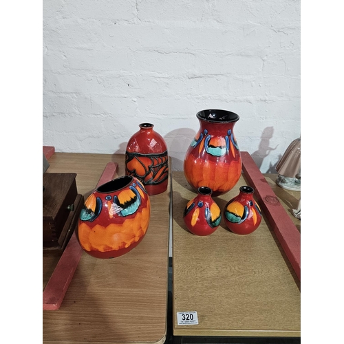 320 - Five pieces of Volcano Poole Pottery