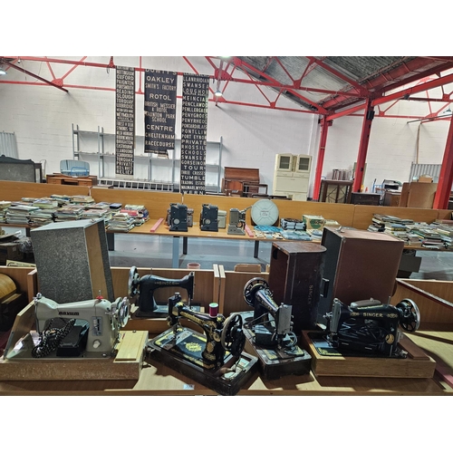 330 - Four Singer sewing machines together with a cased Novum sewing machine