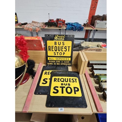 348 - Two original enamel bus stop signs together with one other bus stop sign - all in good condition