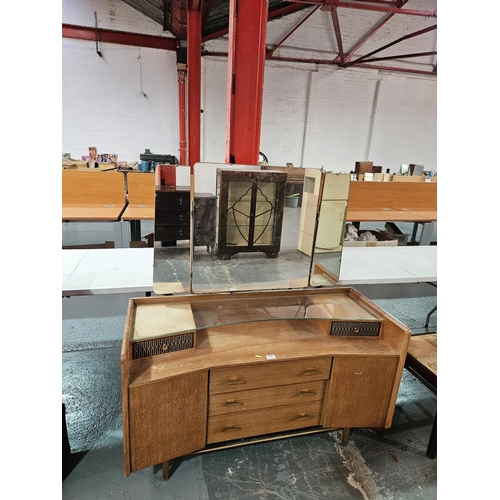 409 - A teak Lebus triple mirror dressing table

Measurements: Height 136cm including mirrors, Width 122cm... 