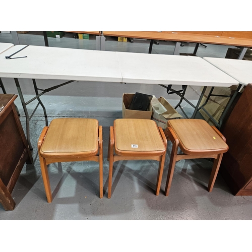 413 - Three teak mid century stools with vinyl seats - possibly Ben stools