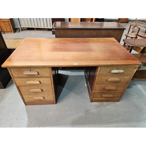 428 - A twin pedestal teak desk

Measurements: Height 74cm, Width 140cm, Depth 77cm