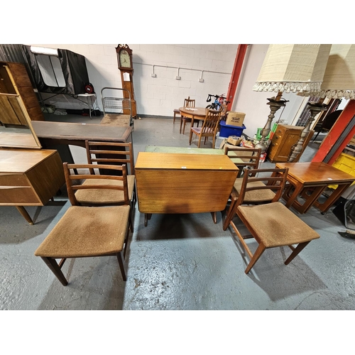 431 - A teak drop leaf dining table with four chairs