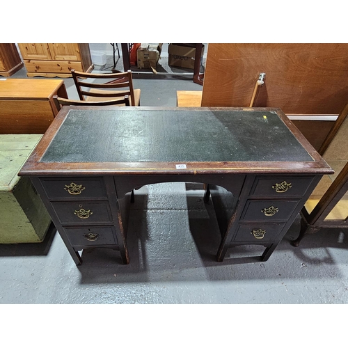 435 - An oak twin pedestal desk with leatherette insert

Measurements: Height 78cm, Width 122cm, Depth 56c... 