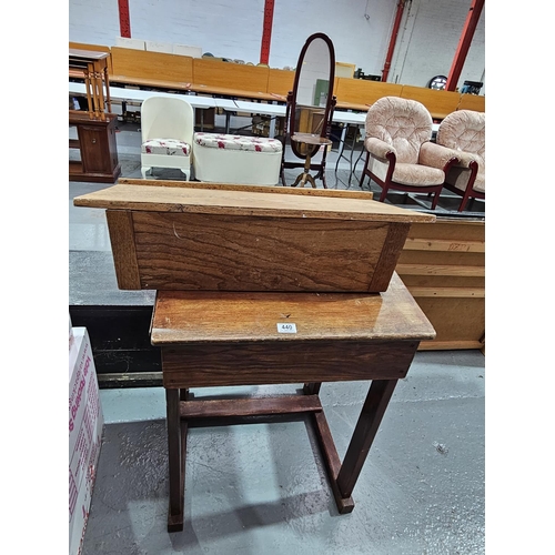 440 - An oak school desk together with an oak lectern