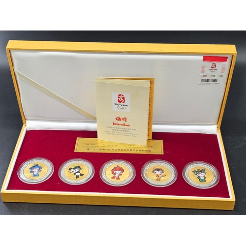 512 - A boxed set of 2008 Beijing Olympic Games Commemorative Mascot Medallions - bronze coated in gold an... 