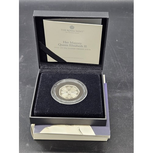 513 - A boxed Royal Mint silver proof 50 pence 2022 coin