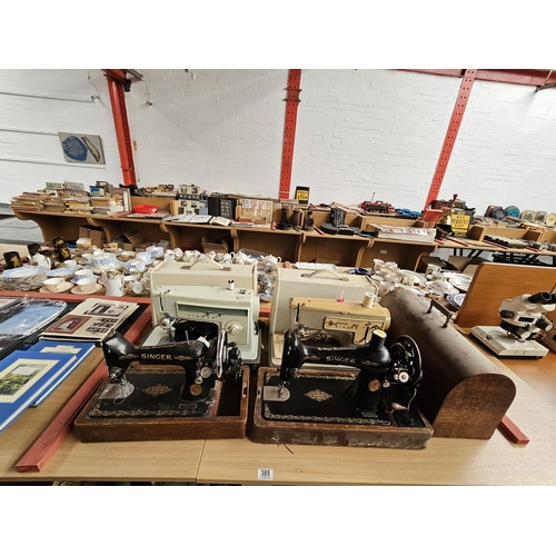 385 - Four Singer sewing machines