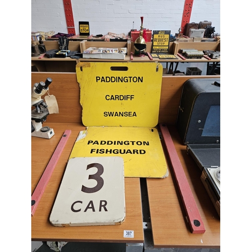 387 - Two railway destination boards - Paddington, Swansea, Fishguard and an enamelled Car 3 sign