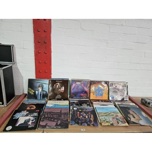 302 - A selection of vinyl records to include Elton John, The Police, The Joker etc