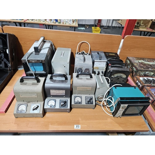 373 - Three Bell & Howell transformers, three universal avometers, Telequipment D61A oscilloscope etc