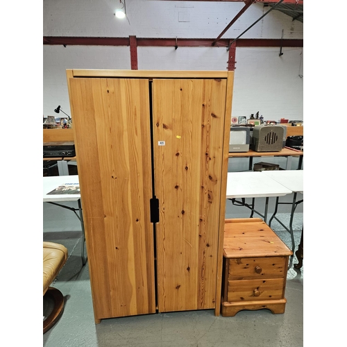 405 - A pine wardrobe together with a pine bedside cabinet

Measurements: Height 168cm, Width 90cm, Depth ... 