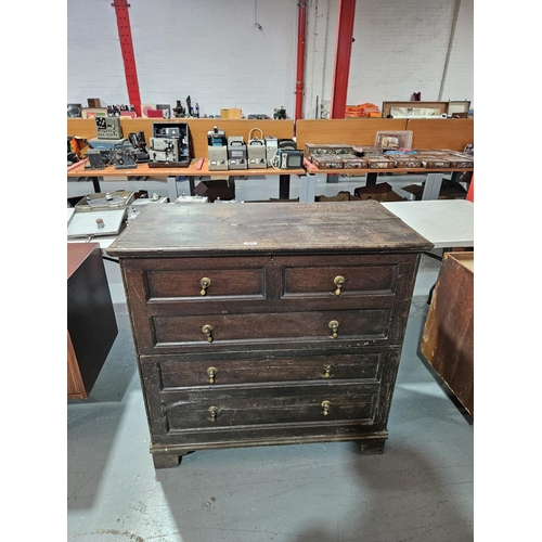 408 - An oak coffer with open top lid and one large bottom drawer

Measurements: Height 96cm, Width 98cm, ... 