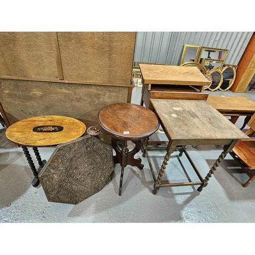 426 - An oak side table on barley twist supports, two occasional tables and a carved top table