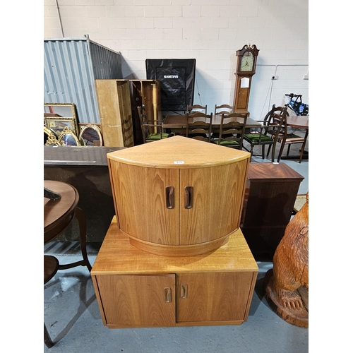 429 - A teak G Plan cupboard together with a corner cabinet