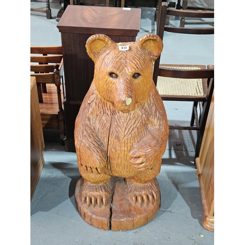 430 - A carved wooden bear

Measurements: Height 83cm