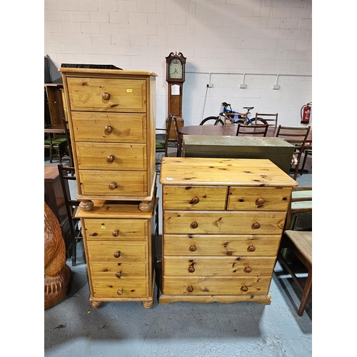 431 - A pine chest of drawers and two bedside cabinets