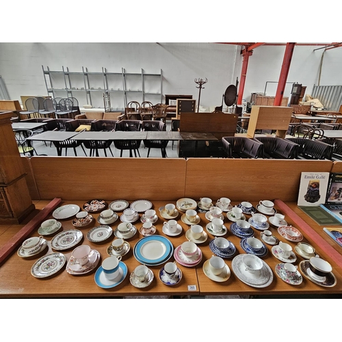 360 - Royal Crown Derby Imari 6041 trio, together with a large collection of cups and saucers