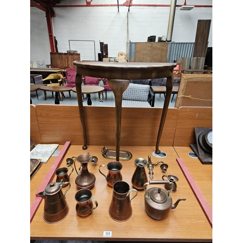 369 - Half moon table and a quantity of metalware