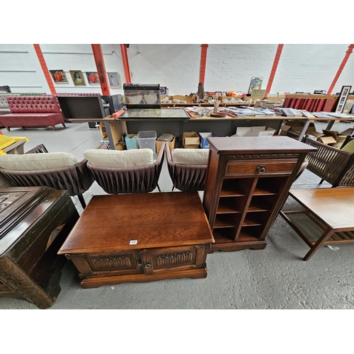 410 - An oak media cabinet and an oak cabinet with drawer