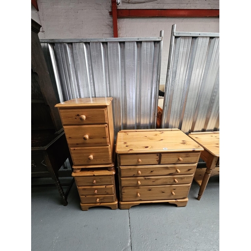 424 - A pine two over three chest of drawers and two bedside cabinets