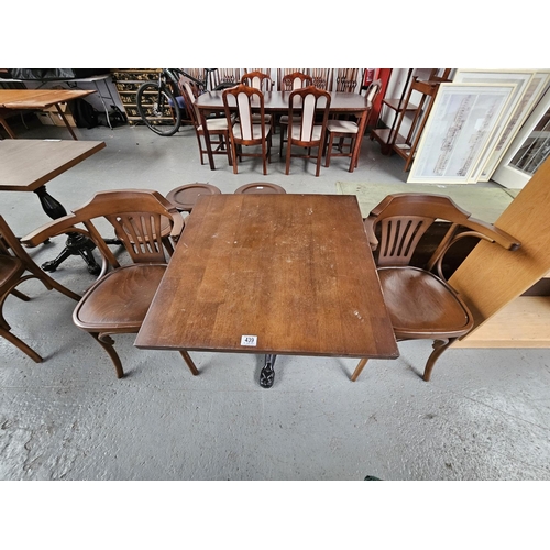 439 - Two Sandalyeci pub/bistro chairs together with a cast iron base wooden top pub/bistro table