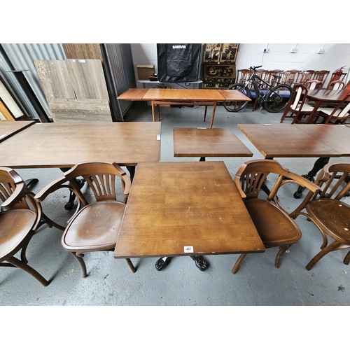 441 - Two Sandalyeci pub/bistro armchairs together with a cast iron base wooden top pub/bistro table