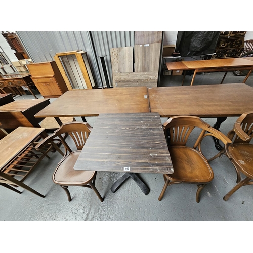 442 - Two Sandalyeci pub/bistro armchairs together with a cast iron base wooden top pub/bistro table