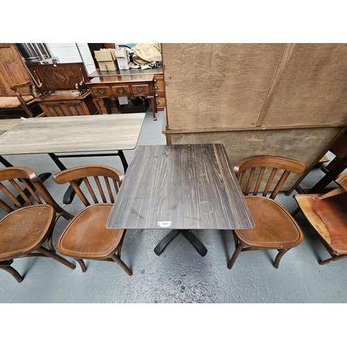 444 - Two Sandalyeci pub/bistro chairs together with a cast iron base wooden top pub/bistro table