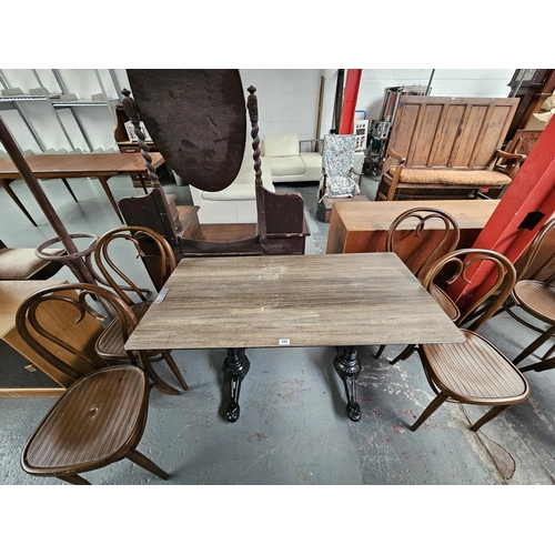 446 - Four Sandalyeci pub/bistro chairs together with a cast iron base wooden top table