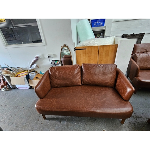 489 - A brown leather Sandalyeci two seater sofa 
H 78cm
W 160
D 78cm