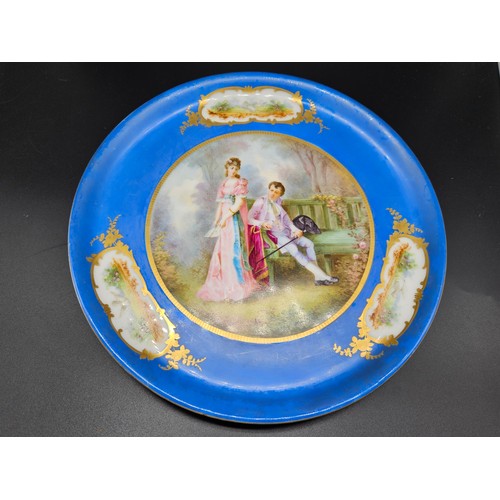 502 - A pair of French 19th century cabinet plates - possibly Sevres - a courting couple in a garden setti... 