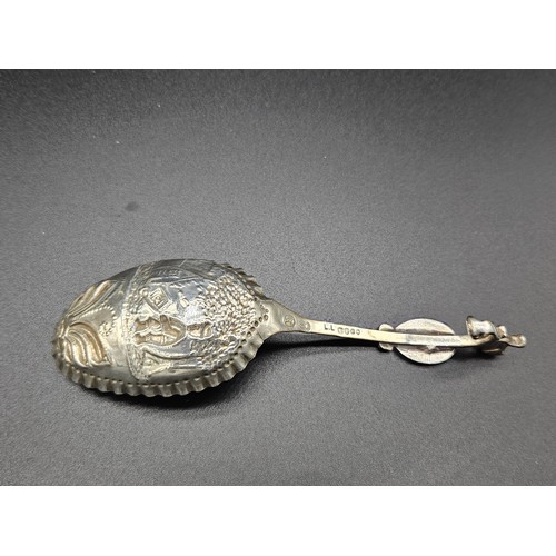 514 - A large hallmarked silver caddy spoon - Dutch silver marks as well as a full set of English hallmark... 