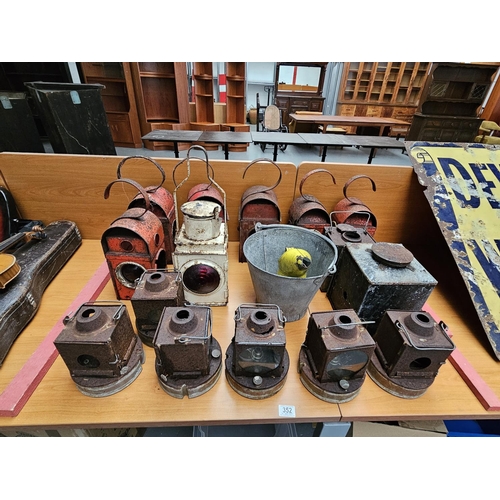 352 - Various railway and road workings Lamps together with a galvanised bucket and oil can.