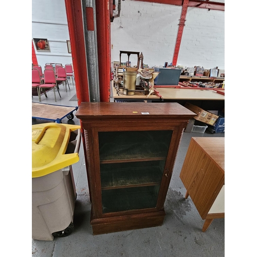 399 - An oak pier glazed cabinet/bookcase