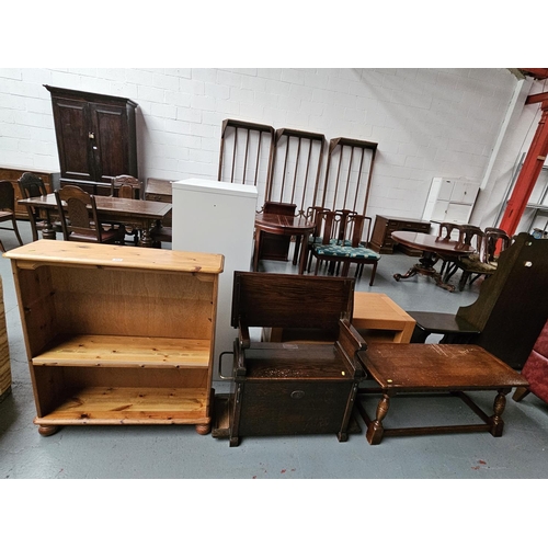 413 - A Pine bookcase, Oak coffee table and a small Oak Monks bench