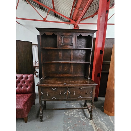 415 - An oak dresser
H 198cm
W 122cm
D 48CM