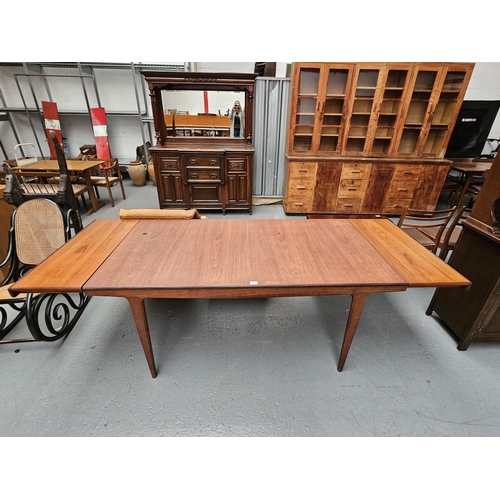 418 - A Mid Century teak extending table believed to be by Scandinavian designer Svend Madsen - two extra ... 