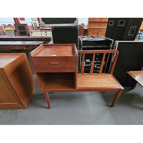 424 - A Teak telephone table