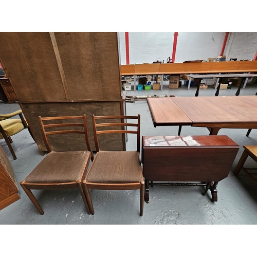 427 - Two Teak dining chairs and a Southerland drop leaf table